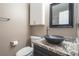 Bathroom with granite vanity, vessel sink, and updated fixtures at 1559 Via Della Scala, Henderson, NV 89052