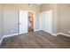 Spacious bedroom with wood-look floors and updated doors at 1559 Via Della Scala, Henderson, NV 89052