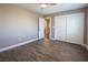 Bedroom with wood-look floors and access to bathroom at 1559 Via Della Scala, Henderson, NV 89052