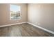 Simple bedroom with hardwood floors and a window at 1559 Via Della Scala, Henderson, NV 89052