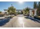 Gated community entrance with pillars and landscaping at 1559 Via Della Scala, Henderson, NV 89052