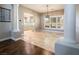 Bright dining room features hardwood floors, large windows, and crown molding at 1559 Via Della Scala, Henderson, NV 89052