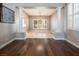 Formal dining room with hardwood floors and large windows at 1559 Via Della Scala, Henderson, NV 89052