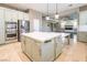 Large kitchen island with white quartz countertop and ample storage at 1559 Via Della Scala, Henderson, NV 89052