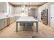 Modern kitchen with an island and stainless steel appliances at 1559 Via Della Scala, Henderson, NV 89052