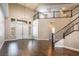 Two-story living room with hardwood floors and high ceilings at 1559 Via Della Scala, Henderson, NV 89052