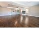 Spacious living room with hardwood floors and a modern fireplace at 1559 Via Della Scala, Henderson, NV 89052