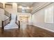 Two-story living room with hardwood floors and high ceilings at 1559 Via Della Scala, Henderson, NV 89052
