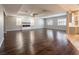 Spacious living room with hardwood floors, fireplace and lots of natural light at 1559 Via Della Scala, Henderson, NV 89052
