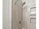 Updated shower with modern tile and dual shower heads at 1559 Via Della Scala, Henderson, NV 89052