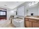 Bathroom boasts double sinks and a large soaking tub at 1836 La Calera Ave, North Las Vegas, NV 89084