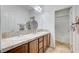 Double vanity bathroom with tile floors and a shower/tub combo at 1836 La Calera Ave, North Las Vegas, NV 89084