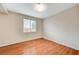 Simple bedroom with wood flooring and neutral walls at 1836 La Calera Ave, North Las Vegas, NV 89084