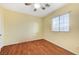 Charming bedroom with wood floors and a window at 1836 La Calera Ave, North Las Vegas, NV 89084