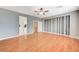 Spacious bedroom with wood floors and ceiling fan at 1836 La Calera Ave, North Las Vegas, NV 89084