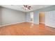 Spacious bedroom with wood floors and private bathroom access at 1836 La Calera Ave, North Las Vegas, NV 89084