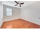 Bedroom with wood floors and ceiling fan at 1836 La Calera Ave, North Las Vegas, NV 89084
