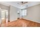 Spacious bedroom with wood floors, ceiling fan and ensuite bathroom at 1836 La Calera Ave, North Las Vegas, NV 89084
