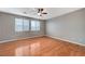 Light and airy bedroom with wood floors and large windows at 1836 La Calera Ave, North Las Vegas, NV 89084