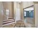Bright entryway with tile floors and staircase at 1836 La Calera Ave, North Las Vegas, NV 89084