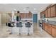 Spacious kitchen with an island, stainless steel appliances, and ample cabinetry at 1836 La Calera Ave, North Las Vegas, NV 89084