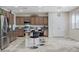 Open concept kitchen with island and stainless steel appliances at 1836 La Calera Ave, North Las Vegas, NV 89084