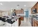 Island kitchen with stainless steel appliances and granite countertops at 1836 La Calera Ave, North Las Vegas, NV 89084
