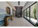 Bright entryway with contemporary decor and courtyard view at 20 Lakefront Dr, Henderson, NV 89011