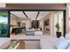 View through sliding doors shows a luxurious living space and kitchen at 20 Lakefront Dr, Henderson, NV 89011