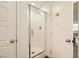 Clean bathroom with a shower stall and white tile at 20 Barbara Ln # 35, Las Vegas, NV 89183