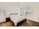 Primary bedroom with carpet, window, and en-suite bathroom at 20 Barbara Ln # 35, Las Vegas, NV 89183