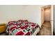 Cozy bedroom with carpet, and a patterned bedspread at 20 Barbara Ln # 35, Las Vegas, NV 89183