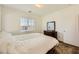 Bright bedroom with a double bed and dresser at 20 Barbara Ln # 35, Las Vegas, NV 89183