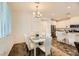 Casual dining area with a modern table and chairs near kitchen at 20 Barbara Ln # 35, Las Vegas, NV 89183