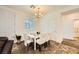 Dining area with white table and chairs, near kitchen at 20 Barbara Ln # 35, Las Vegas, NV 89183