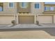 View of attached garages and landscaping at 20 Barbara Ln # 35, Las Vegas, NV 89183