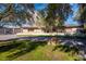 Single story home with a large front yard and driveway at 2800 Ashby Ave, Las Vegas, NV 89102