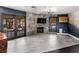 Gathering room features a fireplace, built-ins, and access to backyard at 2800 Ashby Ave, Las Vegas, NV 89102