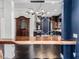Modern kitchen with live-edge island and unique lighting at 2800 Ashby Ave, Las Vegas, NV 89102