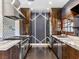 Modern kitchen with stainless steel appliances and dark wood cabinets at 2800 Ashby Ave, Las Vegas, NV 89102