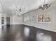 Spacious living area with dark hardwood floors and large windows at 2800 Ashby Ave, Las Vegas, NV 89102