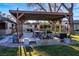 Outdoor patio with fire pit and pergola, ideal for entertaining at 2800 Ashby Ave, Las Vegas, NV 89102