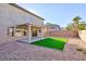 This home features a backyard with low-maintenance landscaping and a covered patio perfect for entertaining at 312 Bella Calabria Ave, Las Vegas, NV 89183
