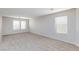 Spacious bonus room features two large windows and neutral carpeting at 312 Bella Calabria Ave, Las Vegas, NV 89183