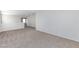 Upstairs bonus room with neutral colors and carpeted flooring at 312 Bella Calabria Ave, Las Vegas, NV 89183