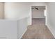 Hallway area with carpeted floor leading into another room at 312 Bella Calabria Ave, Las Vegas, NV 89183