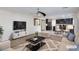 Staged living room featuring modern furniture and décor at 312 Bella Calabria Ave, Las Vegas, NV 89183