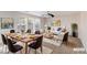 Cozy living and dining area with stylish furniture and natural light at 312 Bella Calabria Ave, Las Vegas, NV 89183