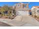 Two-story house with a white garage door and landscaped front yard at 3301 Sonterra Cir, Las Vegas, NV 89117