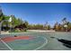 Outdoor community basketball court with palm trees, ready for a fun game at 334 Sea Rim Ave, Las Vegas, NV 89148